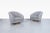 Mid-century modern walnut swivel chairs manufactured by Directional during the 1970s. Beautifully restored, these...