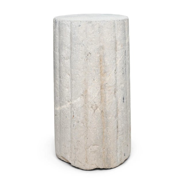 This unusual stone pedestal is actually a late 19th-century cylindrical mill stone. Hand-carved of solid limestone with a...
