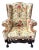 Early 1800s Wingback Arm Chair With Floral Motif For Sale
