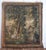 Aubusson tapestry dating from the early 18th century depicting figures and a dog in an architecturally designed green...