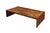 A brutalist coffee table by Percival Lafer. Tessellated teak, jacaranda, and rosewood pieces of different lengths and...