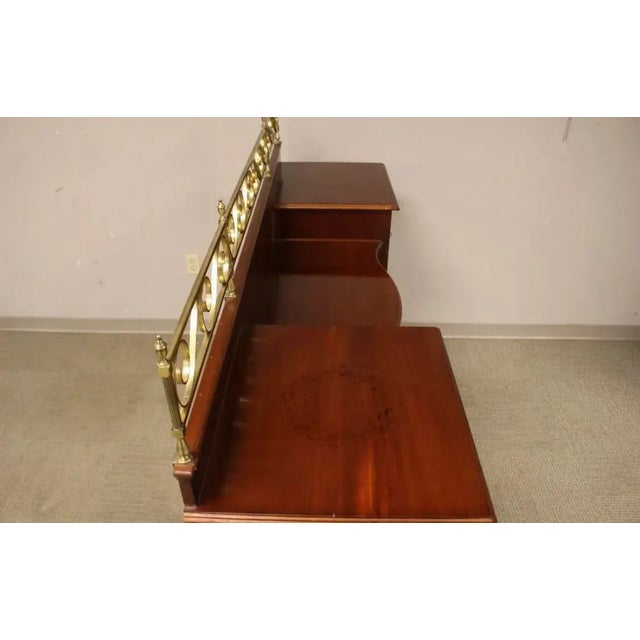 20th Century Sheraton Style Sideboard by Lexington Furniture Ind. The Palmer Home Collection. Sideboard on tall reeded...