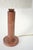 Cylindrical red leather covered lamp, 1940s. Cylindrical lamp base covered in leather with gold-stamped decoration of...