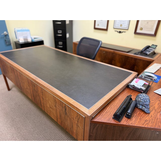 Mid 1970's executive desk with credenza.The desk is 78 " long, 36" deep and 27 !/2 " high. The credenza is 78" long,...