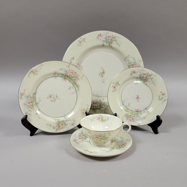 Bring classic charm to your table with this 40-piece service for eight in the beloved Apple Blossom pattern by Theodore...
