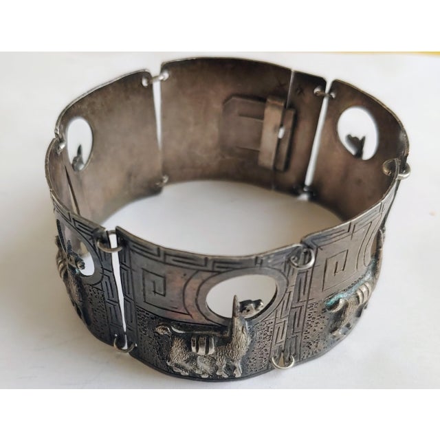 Here's a phenomenal and hard to find marked 925 panel link bracelet by noted Peruvian artist Carlo Mario Camusso. Each...