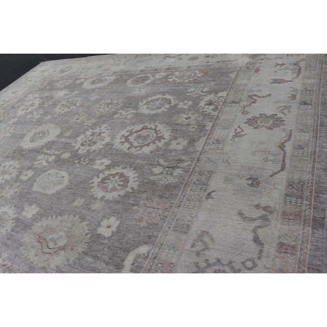 Tribal Large Turkish Oushak Rug in Soft Gray, Ivory, and Taupe With Floral Motifs For Sale - Image 3 of 16