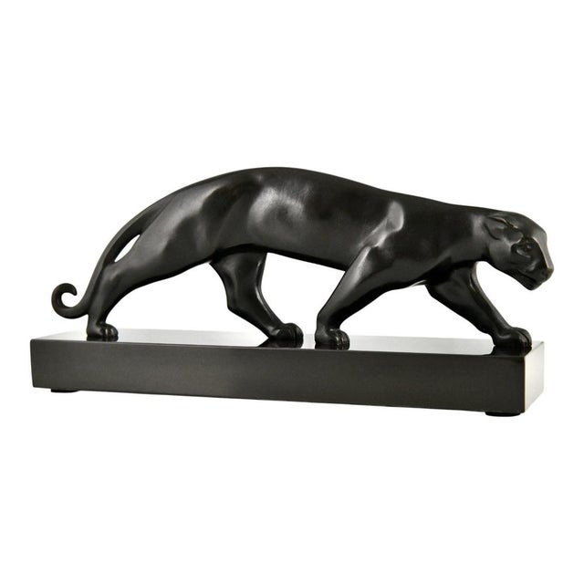 Art Deco bronze sculpture of a panther by Lucien Alliot. Signed Luc. Bronze sculpture with black patina on a Belgian Black...