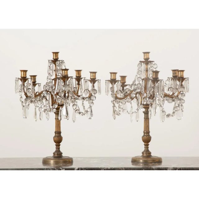 Dimensions: 19 ¼” H x 15 ½” W x 15 ½” D This dazzling pair of French girandoles are in wonderful antique condition. While...