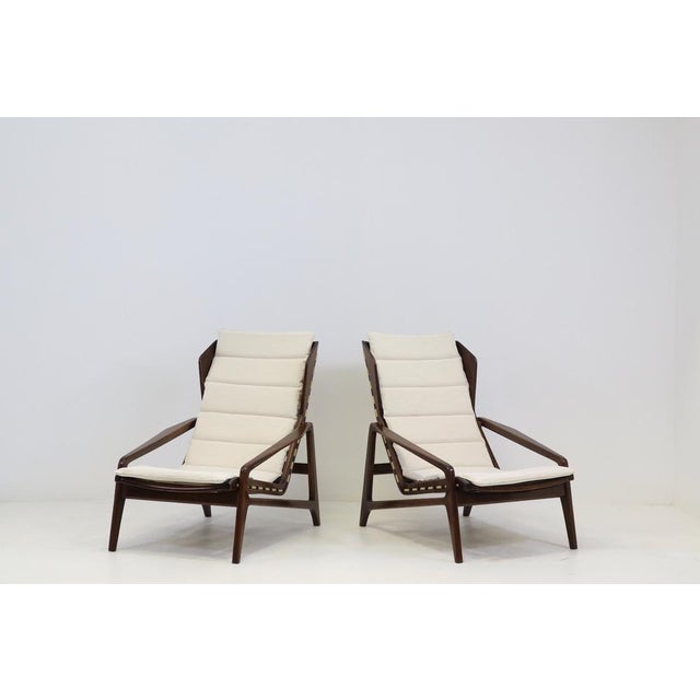 Made in 1957, these rare Model 811 armchairs were designed by Gio Ponti for Figli di Amadeo Cassina. This armchair is...