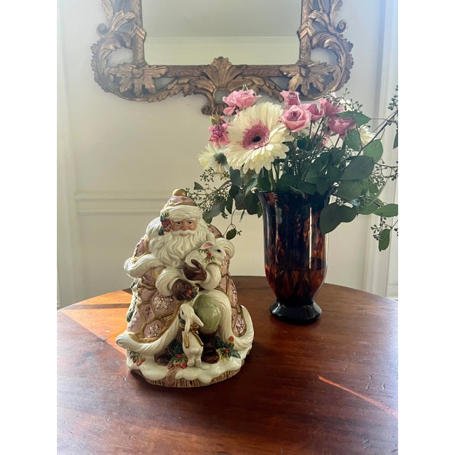 This adorable lidded jar is a wonderful piece for the holiday season. It can be used to store sweet snacks or as a...