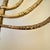 Mid-20th Century Trio Variegated Height Brass Menorahs For Sale - Image 9 of 12