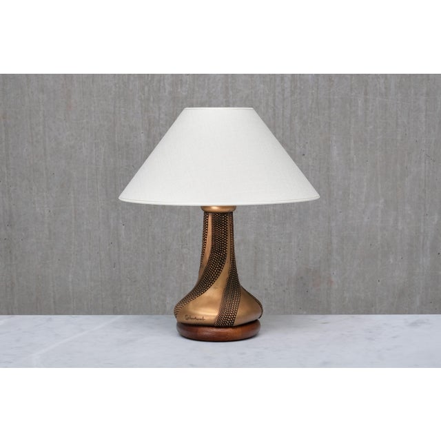 This very rare table lamp was designed by Giovanni Ottaviani and produced by his company Ottaviani in Italy in the 1960s....
