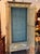 A 19th century Venetian painted armoire, the single door with a scene of classical ruins by the water inside blue rocaille...