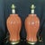 vintage pair of working salmon or dusty peach ginger jar ceramic table lamps featuring Leviton electrical parts. Style:...