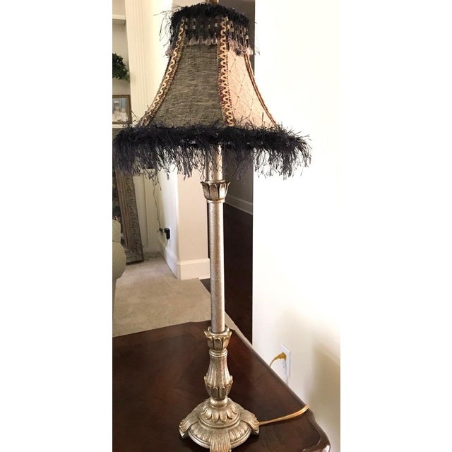 Perfect for an entryway console, bedroom nightstand, or a cozy library corner, this vintage buffet-style table lamp...