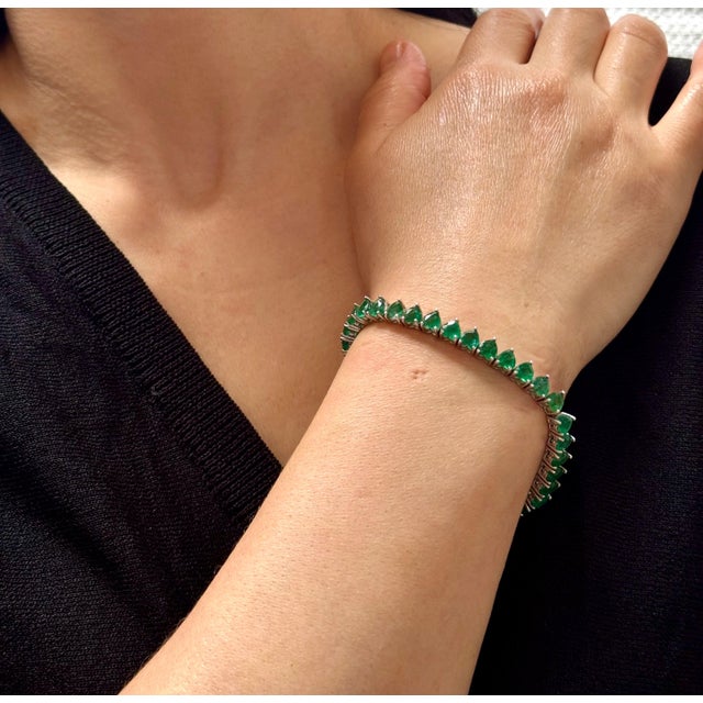 This exceptionally Beautiful Tennis bracelet has 36 stones of Heart shape Emeralds . Total weight of the Emeralds is...