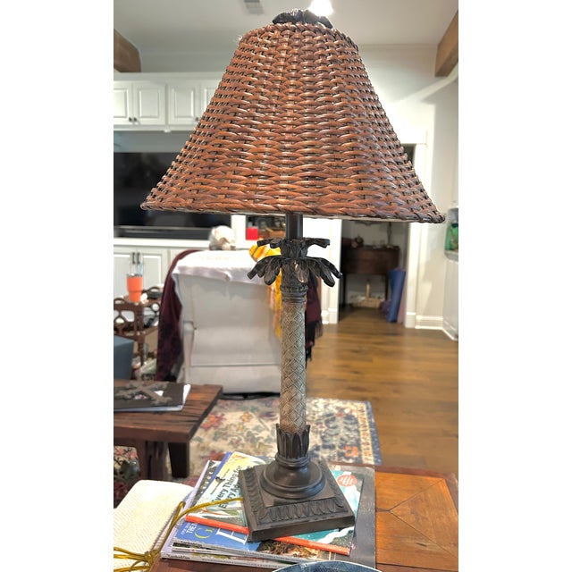 Bring relaxed coastal charm to your home with this beautifully detailed palm-inspired table lamp. The base features an...