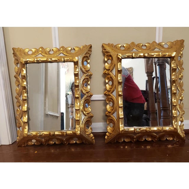 Pair of Italian style Giltwood Frame Mirrored Insets mirrors, Circa 1940s. Solid wood frame material. Each mirror has 24...