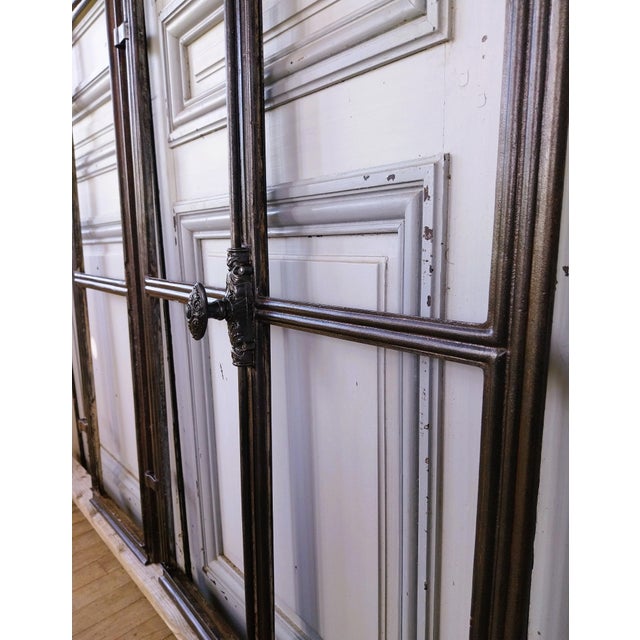 A superb antique stained-glass window from a château, showcasing authentic period craftsmanship. This distinctive piece...