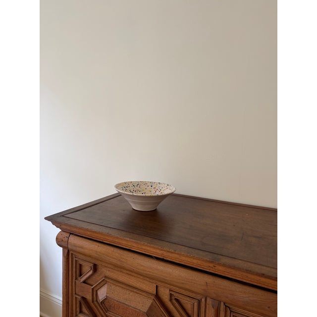 Bring a touch of Spanish craftsmanship to your table with this beautiful handcrafted ceramic bowl, purchased directly from...
