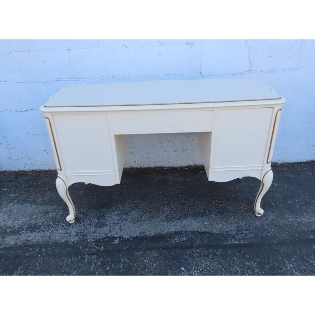 This beautiful Desk is made out of wood, solid wood, laminated, and metal. The desk was made by Bassett Furniture, and it...