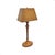 A beautiful antique English table lamp made of turned and carved walnut, with a fluted shaft resting on an oval base...