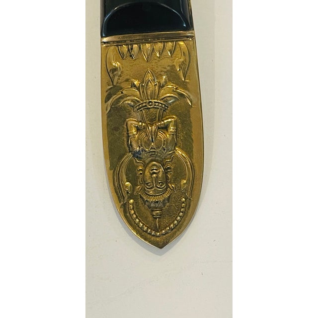 Unique flatware set with Buddha on brass handles Back stamped made in Sinai.