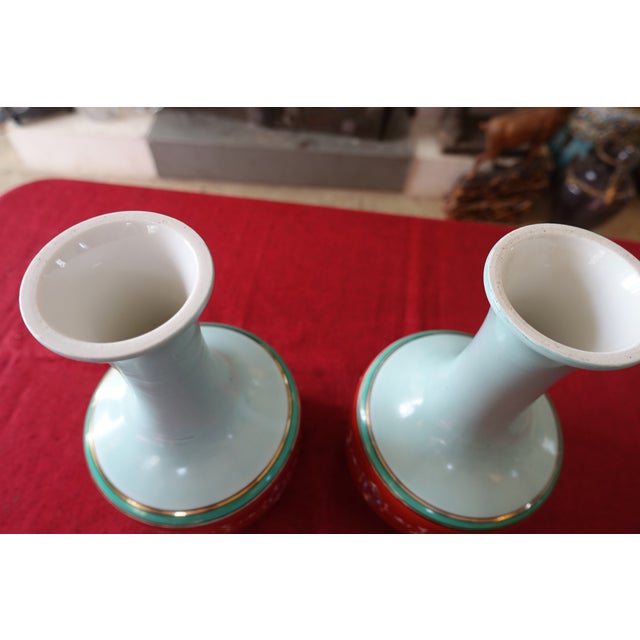 Beautiful coral and turquoise colors for this pair of Art Deco vases. Neo-classical style. These vases have no base. There...