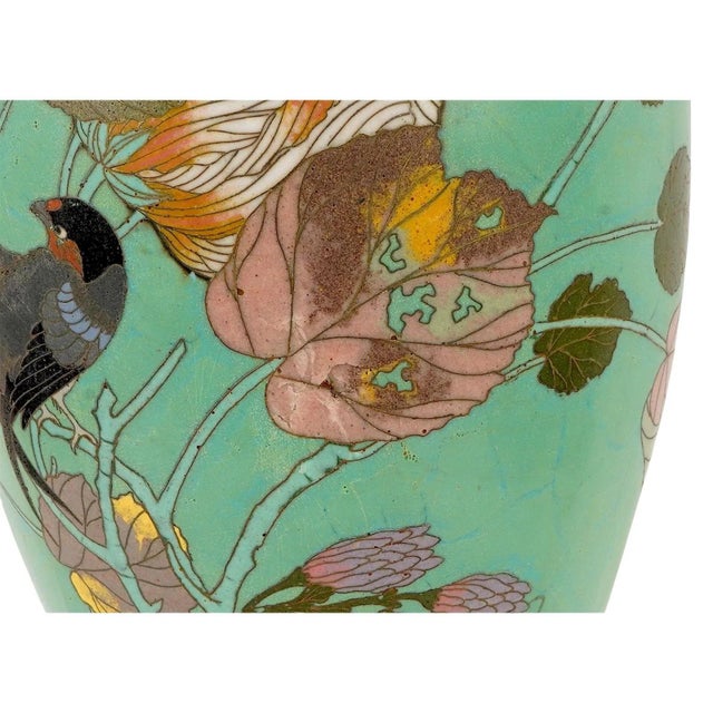 A finely decorated Japanese cloisonné enamel vase dating to the Meiji period, distinguished by its elegant proportions and...
