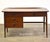 A mid century modern walnut desk with a lipped top and a drawer capable for holding files. Professionally refinished. Made...