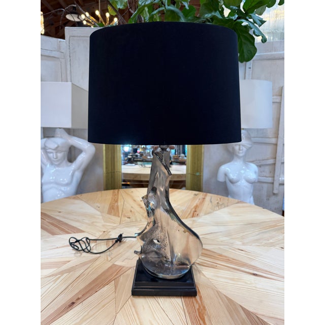 An exceptional and highly dynamic late 20th-century Italian sculptural table lamp designed by master sculptor Sergio...