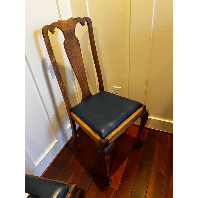 Set of 6 Vintage Custom Bench-Made Queen Anne Walnut Dining Chairs with Burl Description: A remarkably charming and...