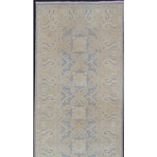 Runner with Geometric Medallions Khotan with Geometric rug , country of origin / type: Afghanistan / Khotan This Khotan...