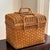 A beautifully handcrafted vintage utility basket woven from honey-toned rattan and wicker with exceptional attention to...