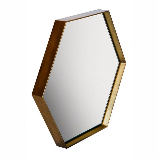 Cassiopeia is a modular system of hexagonal metal wall mirrors made in Italy. The steel frames are hand-crafted and...