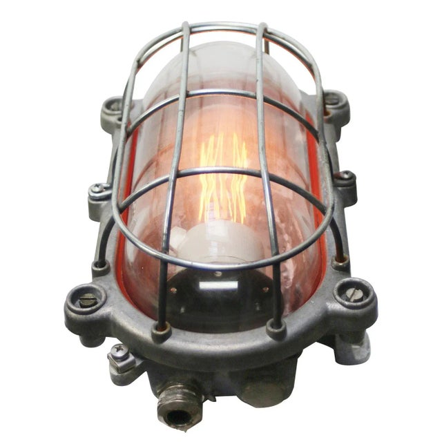 German industrial wall or ceiling lamp made by ‘schuch’ cast aluminum, clear glass e27 / e26 this piece has an attribution...