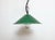 Industrial green enamel factory pendant light made in United Kingdom during the 1950s . White enamel inside the shade....