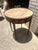 Elegant French Louis XVI side table crafted in walnut with a beautifully figured veneer. It features a single drawer, a...
