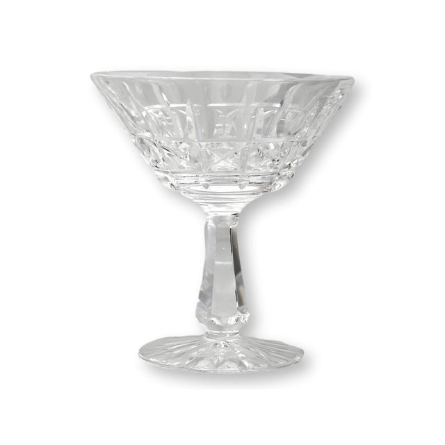 Set of twelve late 20th century Waterford crystal champagne coupes in the discontinued Kylemore pattern. The elegant bowls...