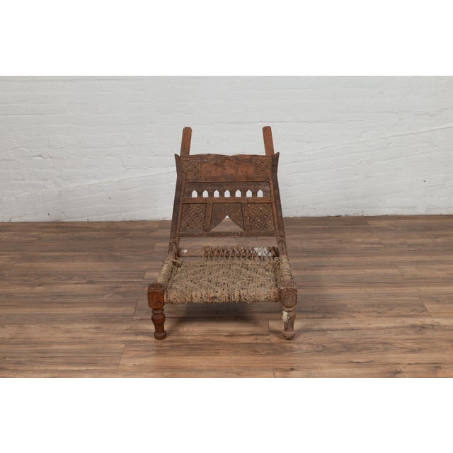 19th Century Rustic Indian Low Wooden Chair With Rope Seat and Weathered Appearance For Sale - Image 5 of 16