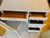 Charming white wicker and wood vintage desk and chair set. Desk is sturdy and in good condition consistent with age and...