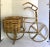 This is such a charming piece from the mid-century of a bicycle that is made of woven wicker rattan with a bamboo frame. I...