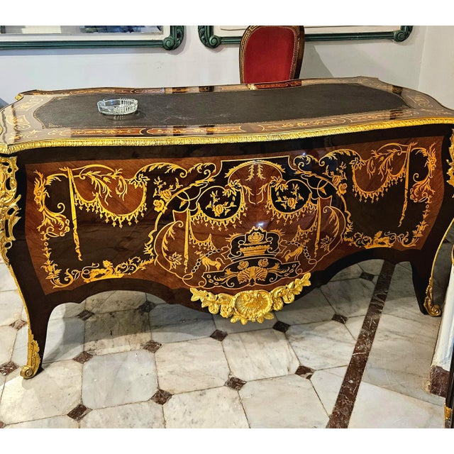 Make a commanding statement with this grand French Rococo-style writing desk, designed for interiors that call for...