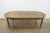 Inspired by 19th century French Empire design, this extension dining table is handcrafted from solid oak and fine veneers...