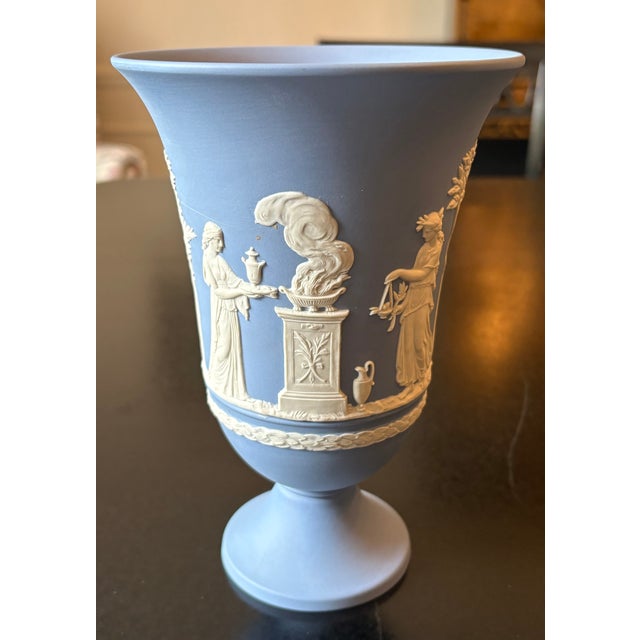 Beautiful Wedgwood blue Jasperware pedestal vase covered with delicate cameo reliefs. Jasperware is a type of pottery...