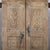 Antique Indian carved teakwood door, c. 1880–1900, carefully bleached to highlight its sculptural carvings and lighten the...