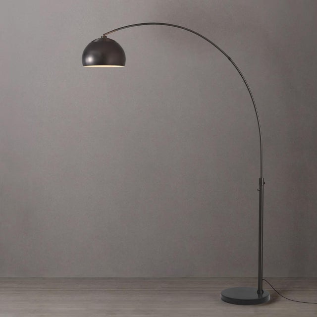 The Half Dome Arc Lamp is a modern lighting masterpiece by designer Peter Morelli, continuing NOVA of California's century...