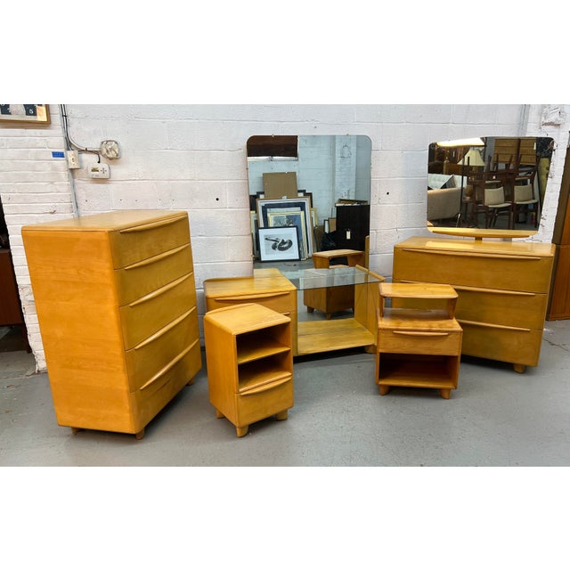 Bring timeless mid-century modern style to your home with this exceptional five-piece bedroom suite by Heywood-Wakefield....