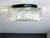 Vintage flush mount ceiling or wall light. Made in Portugal in the 1990s. It is made of clear glass and black painted...